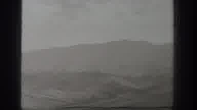 Wyoming USA (1939): The Distant View Of Mountain Is Viewed From The Moving Vehicle