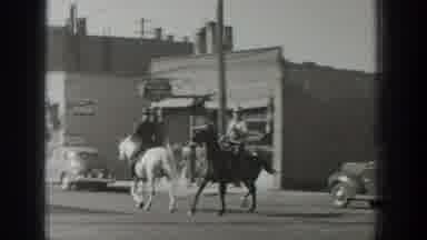 Wyoming USA (1939): Black And White Footage Of Westerners On A Horse Galloping On