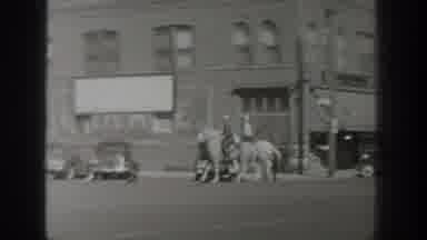 Wyoming USA (1939): Individuals Riding Horses On A Dirt Road In What Appears To Be