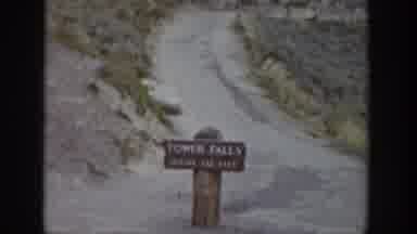 Wyoming USA (1939): Tower Falls Sign Cliffside Pathway Trees Dirt Path Blue Skies