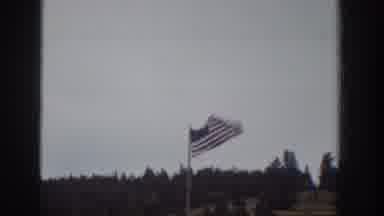 Wyoming USA (1939): Man Watching Wind Flying Flag Rural Woods Rocks Meadow House