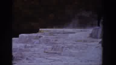 Wyoming USA (1939): Old Steaming Cascading Waterfall And A Car Driving Past A