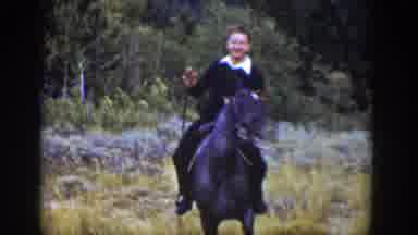 Wyoming USA (1939): A Man Enjoying Horse Riding With His Friends In A Sunny Day