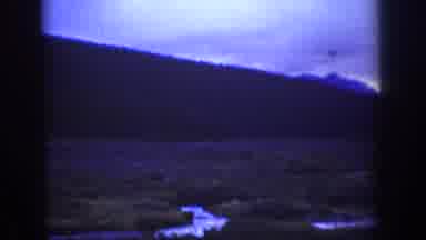 Wyoming USA (1939): Multiple Shots Of Landscape And White Building On A Dark And