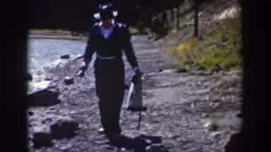 Wyoming USA (1939): Men Standing Next To Lakeside Fishing One Man Walking Along