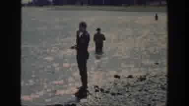 Wyoming USA (1939): Men Fishing In Water,Seal Sitting On Wooden Dock Platform At