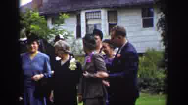 Wyoming USA (1939): Group Of People Gathered For Social Celebration In Front Of