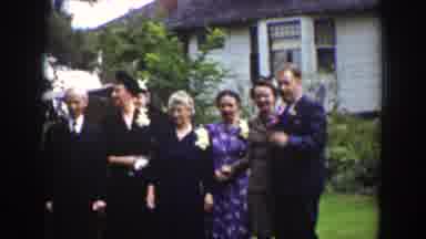 Wyoming USA (1939): A Group Of People Dressed Very Nicely Standing Together To Get