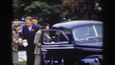 Wyoming USA (1939): Young Women Waving And Getting Into An Old Car Somewhere