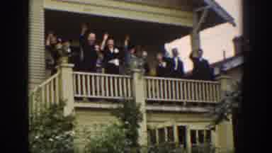 Wyoming USA (1939): Cheerful Group Of People Waving From The Main Porch Of A