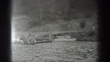 Washington USA (1940): Young Men Of The Past Leisurely Riding A Boat Down A Local