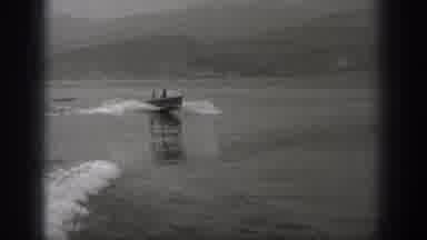 Washington USA (1940): Small Boat With 2 Men Going Very Fast Through A River And