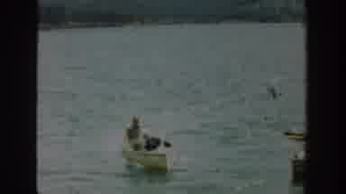 Washington USA (1940): It Shows A Boating The Man Was Boating On The Water