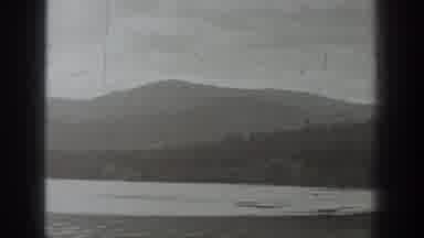 Washington USA (1940): Woman Holds Caught Fish On A Mountain Lake Pier Platform