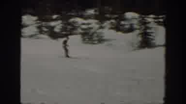 Washington USA (1940): Young Man Skiing Down A Snow Covered Hill