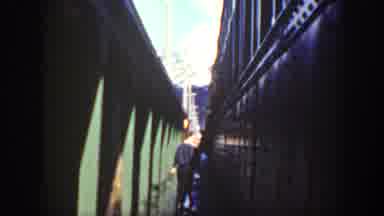 Washington USA (1940): Some People Are Walk Out From The Train And Enjoying Rain