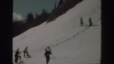 Washington USA (1940): People Skiing Down A Snow Covered Hill