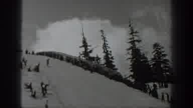 Washington USA (1940): Man Doing A Ski Jump Down Hill In A Beautiful Snowy