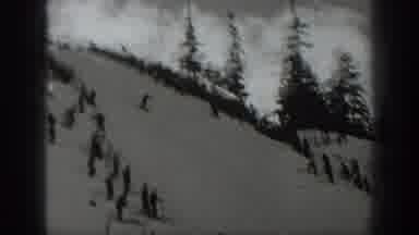 Washington USA (1940): People Skiing Down Snowy Mountain As Crowd Watching From