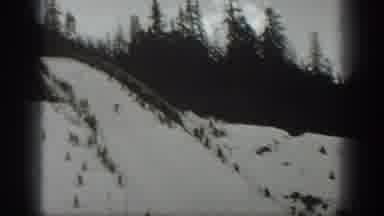 Washington USA (1940): Skiing Down Snow Covered Steep Hill While Crowd Below