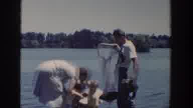 Wisconsin USA (1953): Women Taking Care Of Two Children Near The Lake