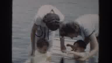 Wisconsin USA (1953): Two Women Enjoying A Family Fishing Trip With Their Young