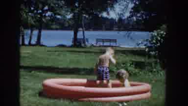 Wisconsin USA (1953): Family Moments In A Park With Children In A Small Pool And