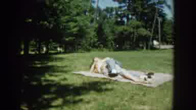 Wisconsin USA (1953): People Relaxing By Lake, Children Playing In A Paddling Pool