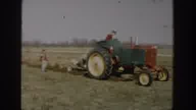 Wisconsin Dells Wisconsin USA (1954): One Man Is Driving The Tractor,Other Is In