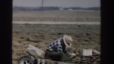 Wisconsin Dells Wisconsin USA (1954): A Man Working In His Fields, In The Rear