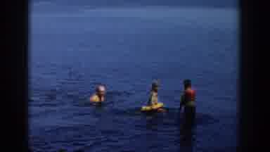 Wisconsin Dells Wisconsin USA (1954): People Swim In Shallow Water Off A Wooden