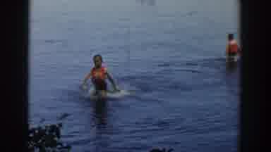 Wisconsin Dells Wisconsin USA (1954): Baby Boy Finishes Up Swim Within The Ocean