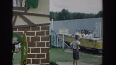 Wisconsin Dells Wisconsin USA (1954): Child Watches Family Riding On Toy In