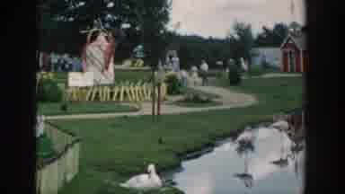 Wisconsin Dells Wisconsin USA (1954): Boy Running From Red Shed Located In Festive