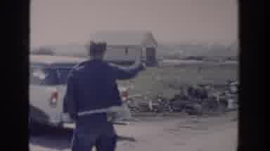 Grand Rapids Michigan USA (1956): A Man Is Guiding The Vehicle To Move On At A