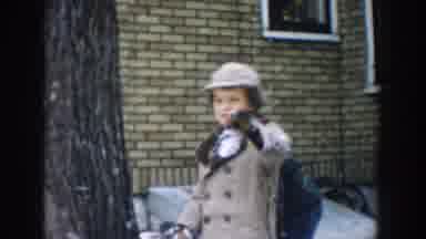 Michigan USA (1957): Children Play In The Snow On A Typical Winter Day Outside The