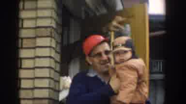 Michigan USA (1957): Grandpa Taking Baby Boy Outside In Cold Weather