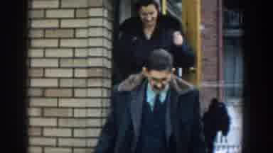 Michigan USA (1957): Older Married Couple Getting Ready To Leave The House With