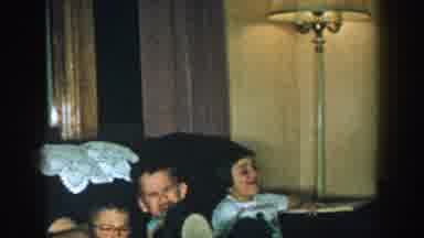 Michigan USA (1957): A Family Consisting Of Many Children Gather In A Living Room