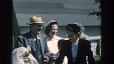Michigan USA (1957): Women, Children And Male Outside Dressed Up Taking Picture