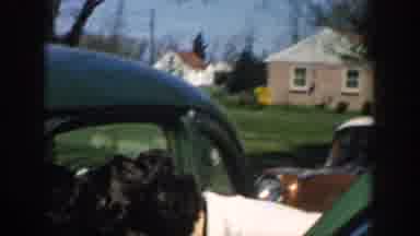 Michigan USA (1957): Family In A Garden Getting Ready For A Road Trip