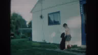 Michigan USA (1957): Boy Trying To Go Away But Its Pet Not Allowing Him To Move