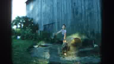 Michigan USA (1957): The Dog Is Well Playing In The Child To Saw Cute