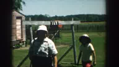 Michigan USA (1957): The Child Playing The Swing And Our Mom Is Coming To Him