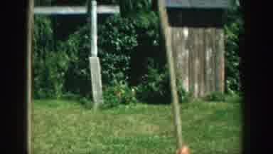Michigan USA (1957): A Little Boy Having Fun Sitting On A Swing