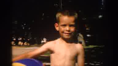 Michigan USA (1957): A Boy Getting Football And Take A Pose To The Camera