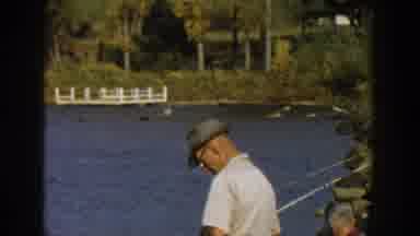 Wisconsin USA (1957): Men And Women With Fishing Rods Out On The Rocks Near The