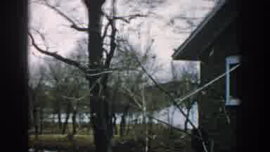 Wisconsin USA (1957): Old Video Outside House With Trees, Mailbox, And Man