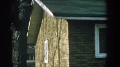 Wisconsin USA (1957): A Lady With The Boy Is Standing Among The Multiple Houses