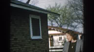 Wisconsin USA (1957): A Boy And What Appears To Be His Mother Sitting For A Chat,